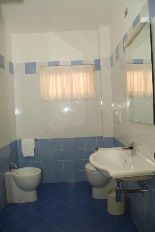 Апарт отель C.A.V. Residenza Prisco Марина-ди-Гроссето Номер фото